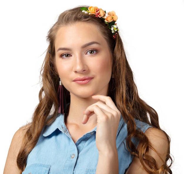 Young woman in a thoughtful pose