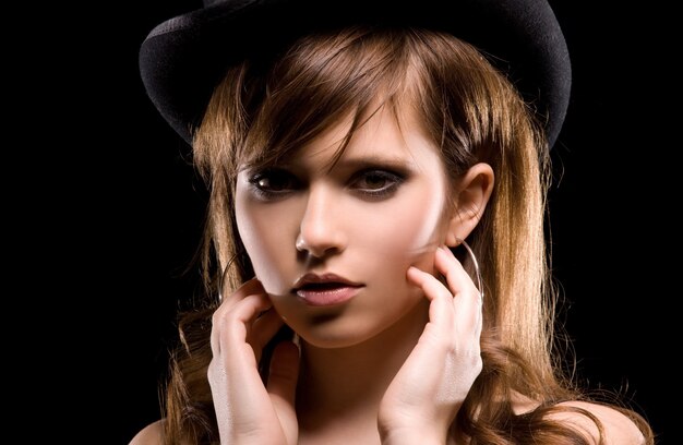 Young woman in top hat