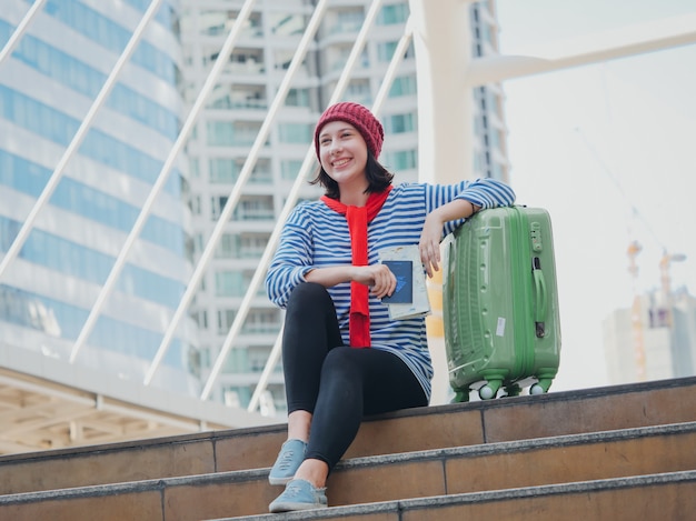 Young woman torist traveling on the city