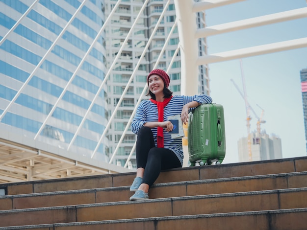 Young woman torist traveling on the city