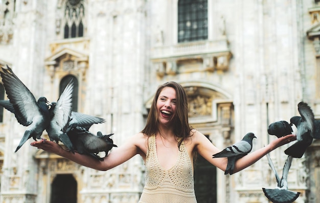 Young woman tourist on Duomo Cathedral Milan