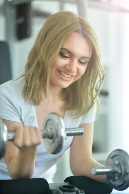 Young woman training in gym