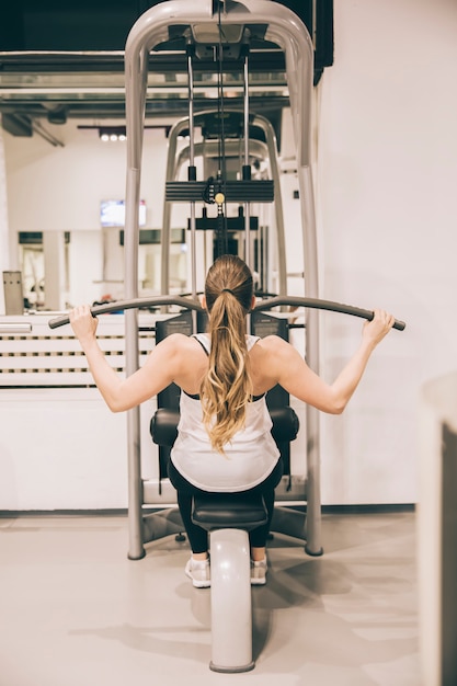 Young woman training in the gym