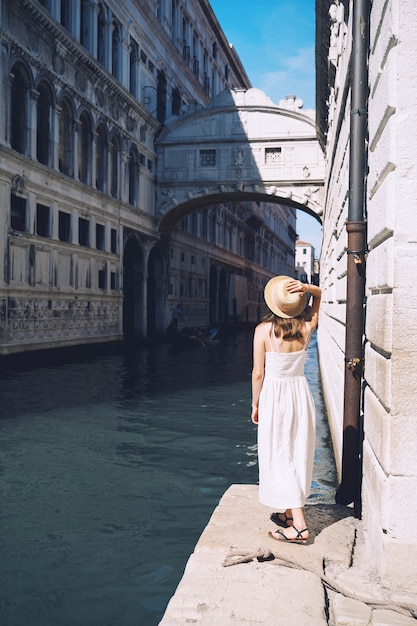 Young woman travel Italy Vacation in Europe Girl enjoy beautiful view in Venice