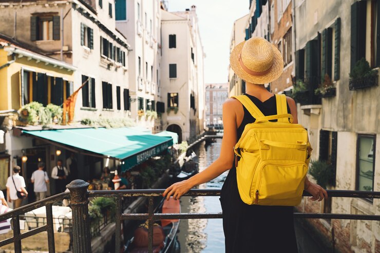 young woman travel italy vacation in europe girl enjoy beautiful view in venice