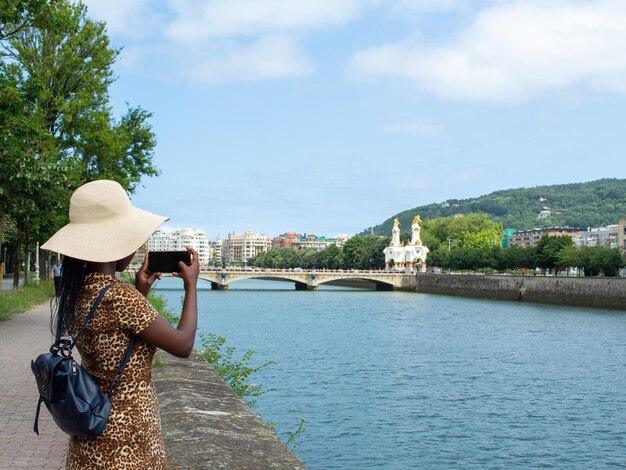 Young woman travelling and enjoying nature San Sebastin Donostia Euskadi Spain