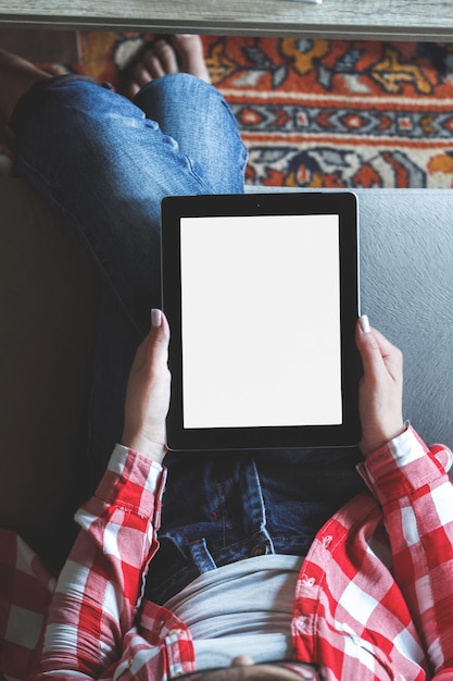 Young woman uses a tablet