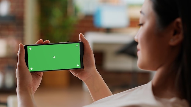 young woman using digital tablet