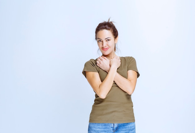 Young woman using hands top prevent and stop something