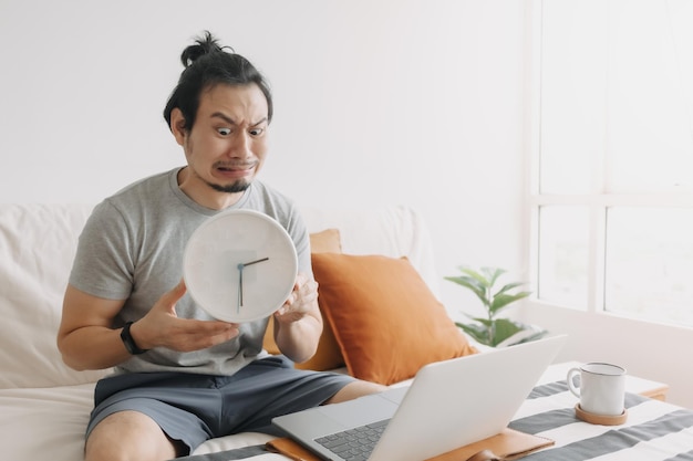 Young woman using laptop at home