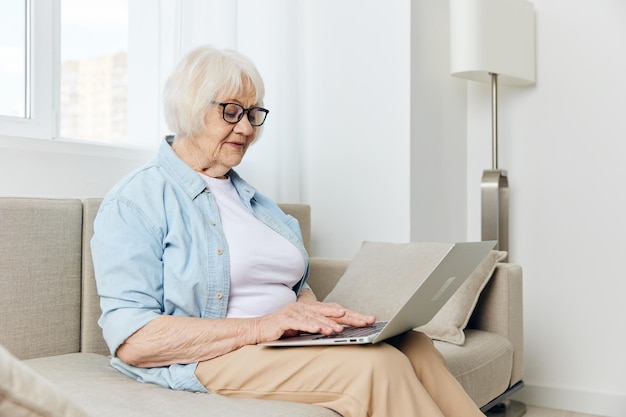 Young woman using laptop at home