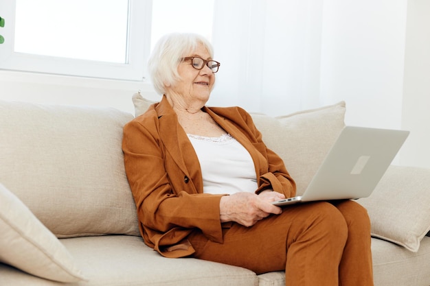 Young woman using laptop at home