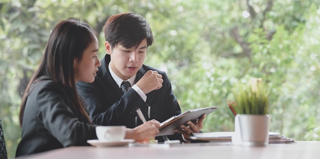 Young woman using laptop on table