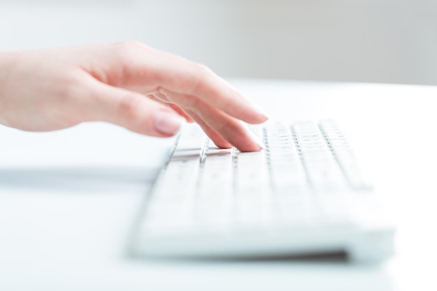 Young woman using laptop for work