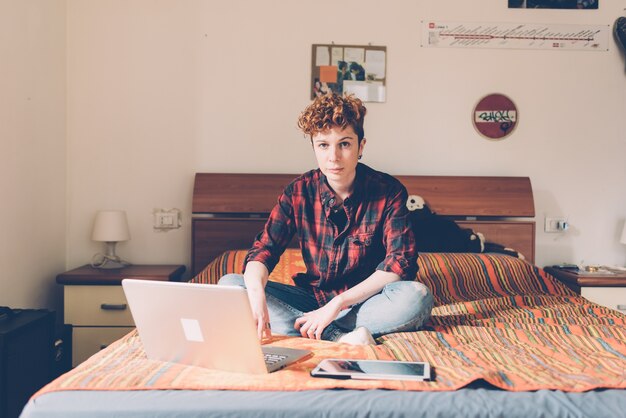 young woman using laptop