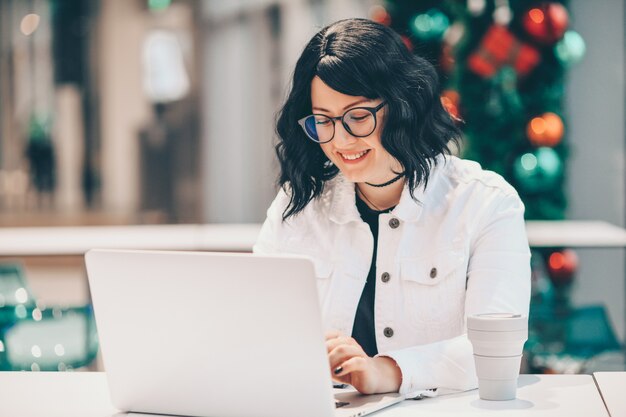 young woman using laptop