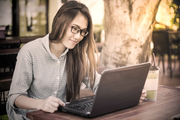 Young woman using laptop