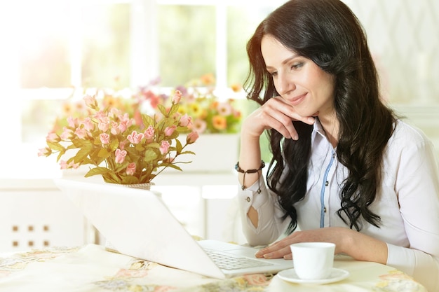 Young woman using laptop