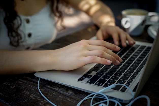 Young woman using laptop.