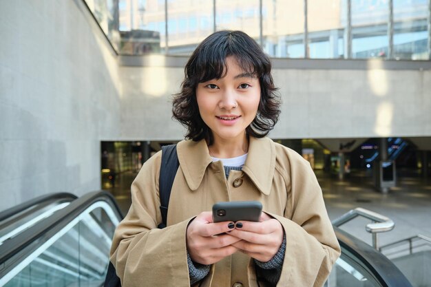 Young woman using mobile phone