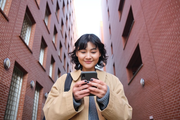 Young woman using mobile phone