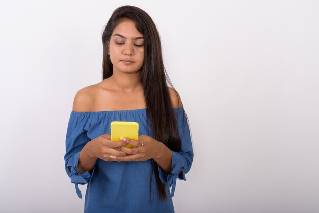 Young woman using mobile phone