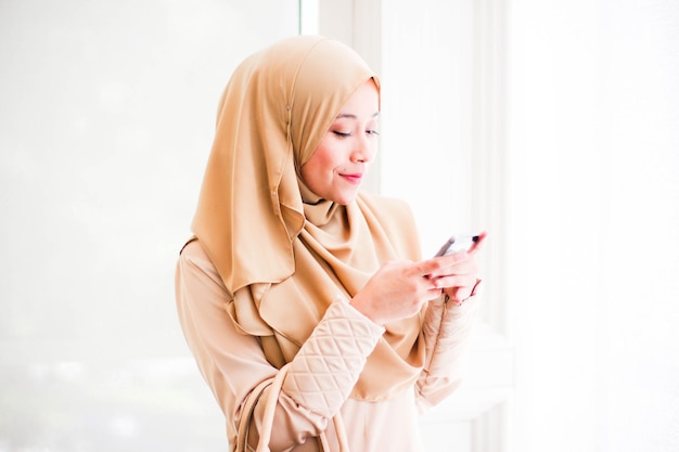 Young woman using smartphone