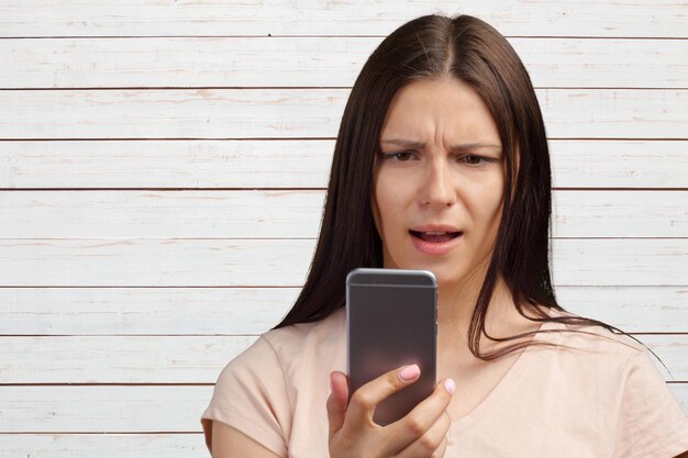 Young woman using smartphone