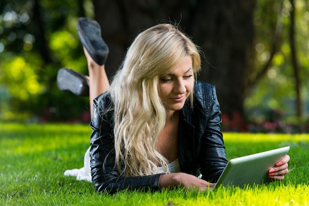 Young Woman Using Tablet Notebook