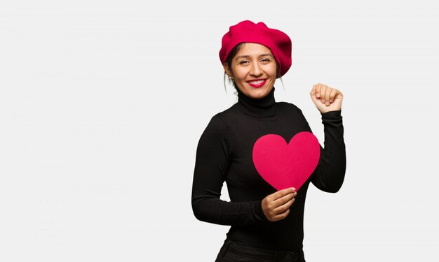 Young woman in valentines day dancing and having fun