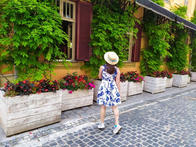 Young woman walking on the street of Lviv