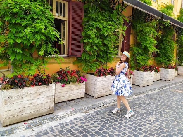 Young woman walking on the street of Lviv