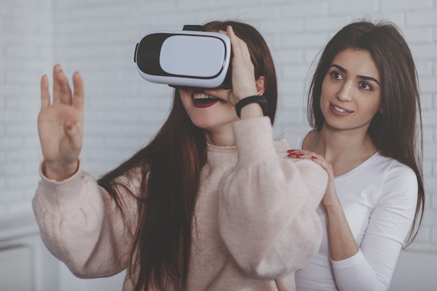 Young woman wearing 3d virtual reality glasses