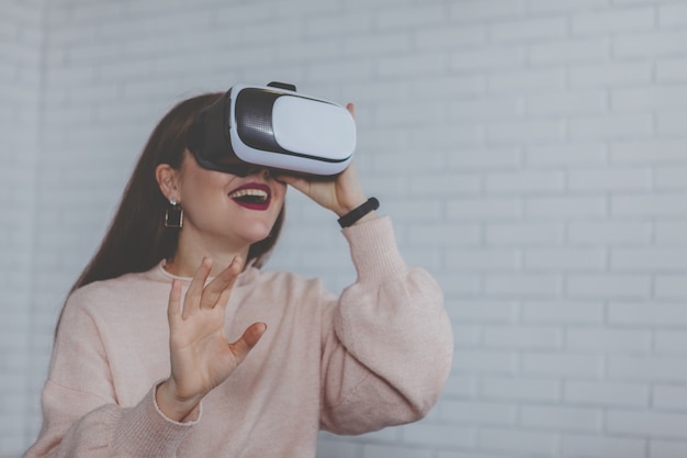 Young woman wearing 3d virtual reality glasses