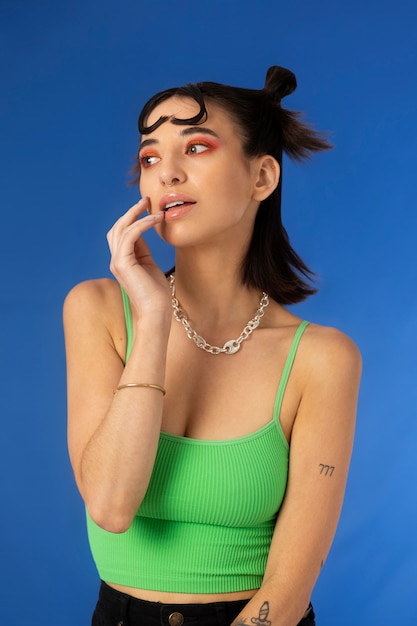 Young woman wearing chain necklace