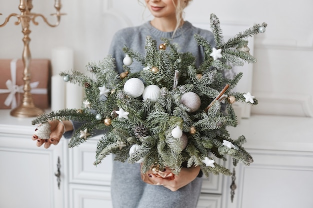 Young woman wearing cozy warm sweater