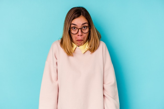 Young woman wearing glasses posing