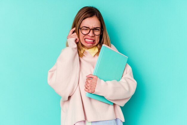 Young woman wearing glasses posing