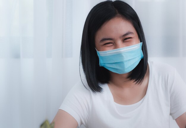 Young woman wearing mask