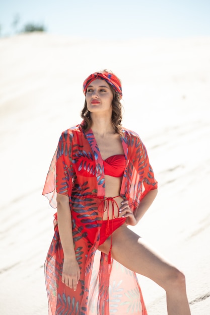 Young woman wearing red beach wear