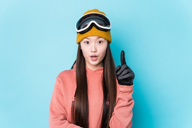 Photo young woman wearing ski clothes having some great idea