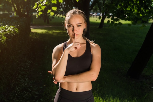 Young woman wearing sportswear in the park