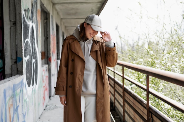 Young woman wearing trucker hat