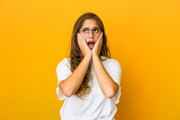 Young woman whining and crying disconsolately