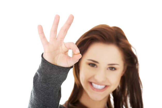 Young woman over white background