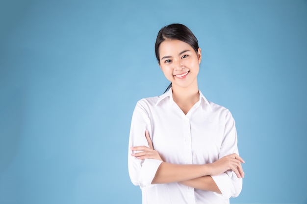 Young woman in white shirt smiling