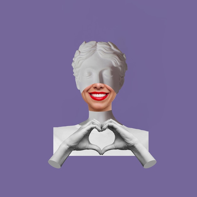 Young woman in a white t-shirt headed by antique statue showing a heart shape with hands