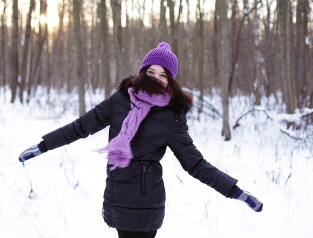 Young woman in winter park