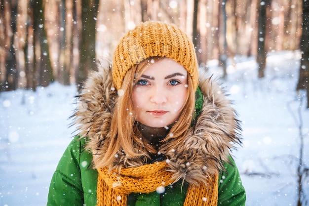 Young woman winter portrait Closeup portrait of happy girl