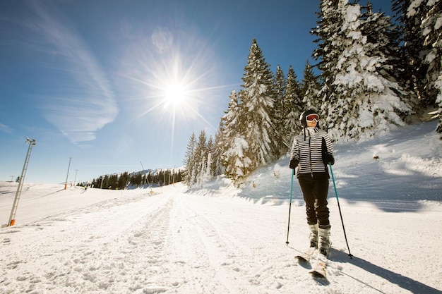 Young woman at winter skiing bliss a sunny day adventure